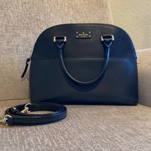 Kate Spade, New York black leather handbag. Bag has top handles & strap.